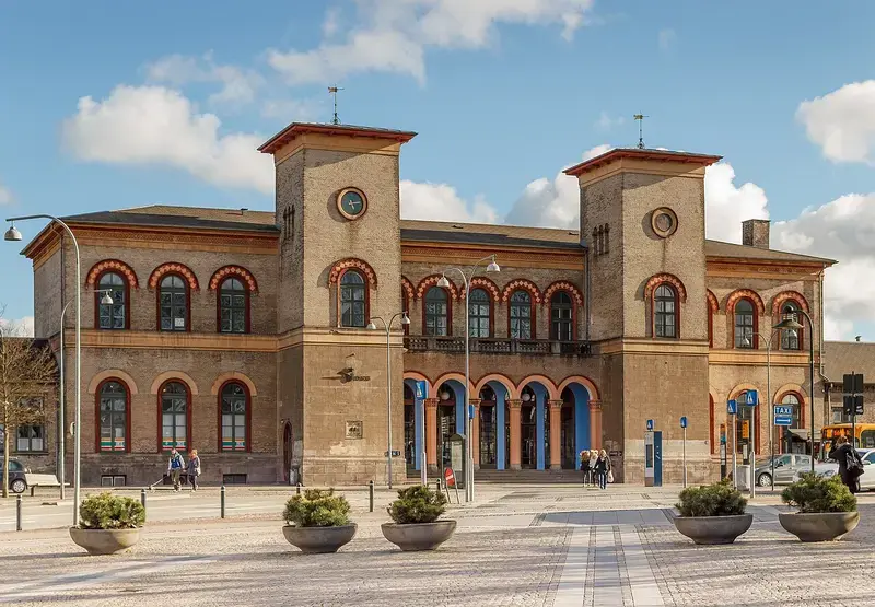 Historic Roskilde Station building with clock towers