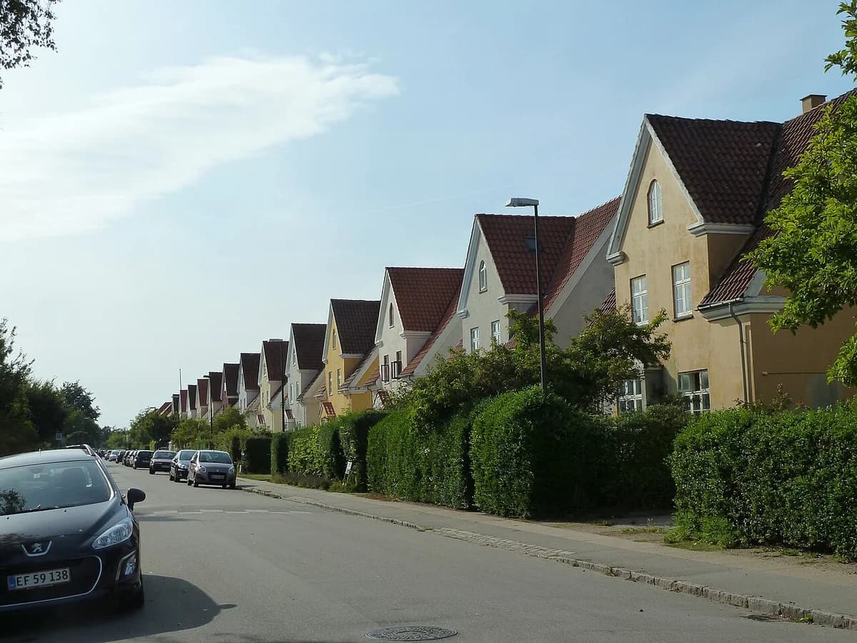 Row of modern houses along a street in Valby, Copenhagen.