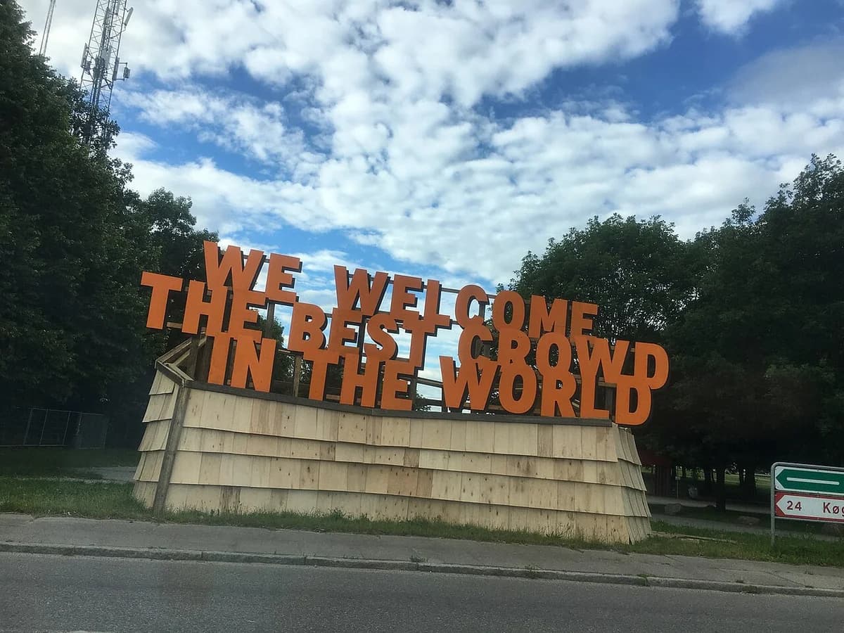Outdoor welcome sign for Roskilde Festival 2024.